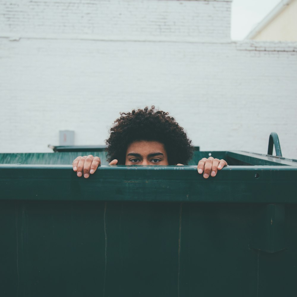 man inside above ground pool