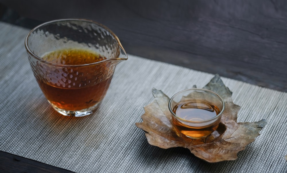 clear glass pitcher and bowl