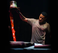 Industrial-scale mixing tanks blending iron oxide pigments with precision.