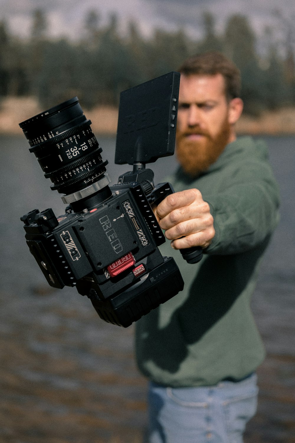 person holding professional video camera