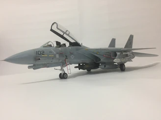 High-quality f-15ex model jet displayed on a desk with detailed markings.