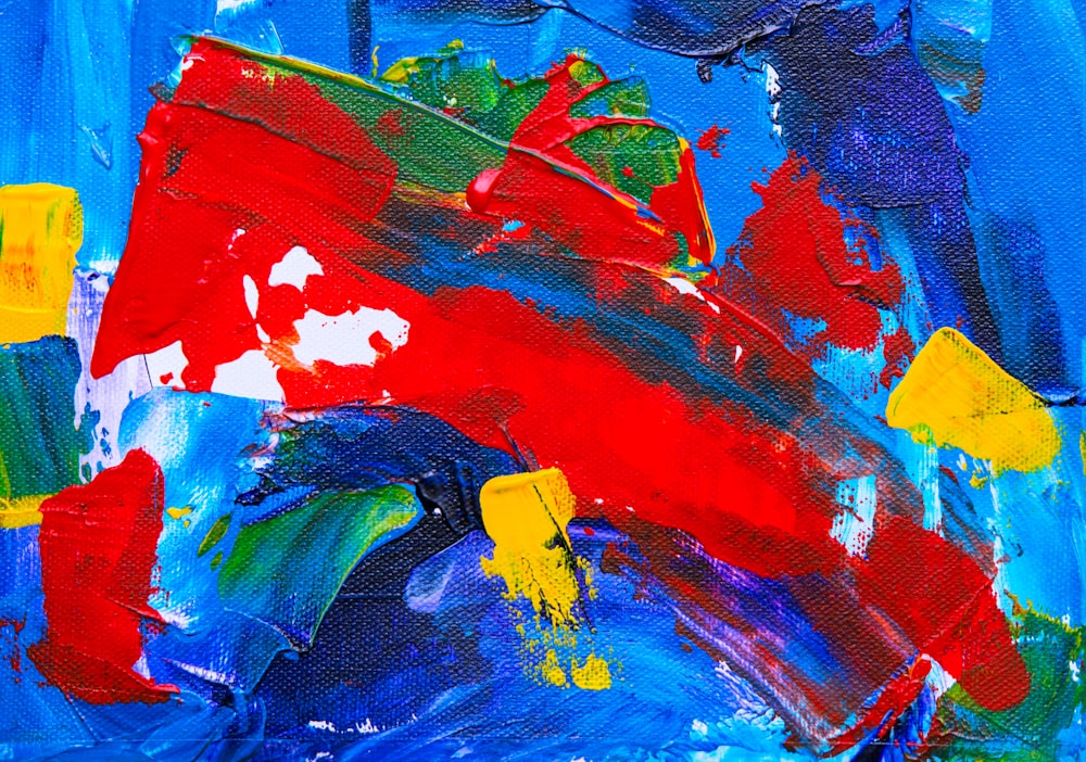 peinture abstraite rouge, jaune et bleu