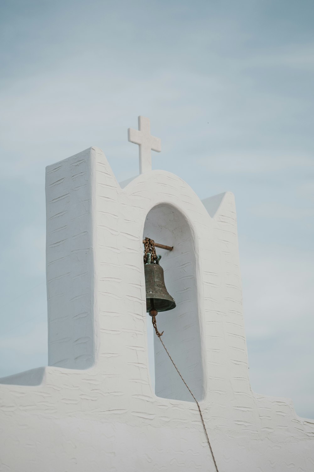 bell in white structure