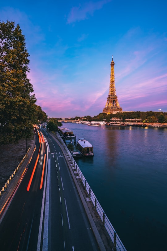 road in front of Eiffel Tower during daytime in Pont de Bir-Hakeim France