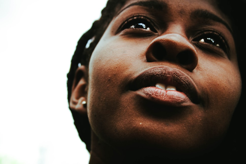 close up photography of woman's face