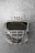 Close-up image of a sleek Kenny Hockey helmet resting on ice with a blurred rink background.