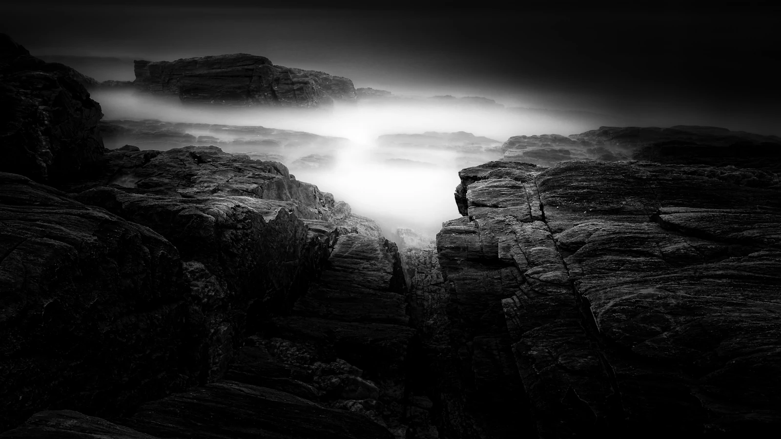 Blurred, dreamlike landscape with glowing, ethereal light