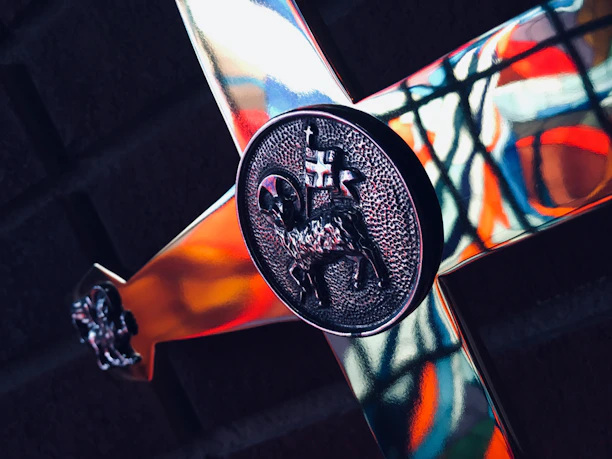 Close-up of intricately detailed cross-hatching artwork on a trok card with metallic silver accents.