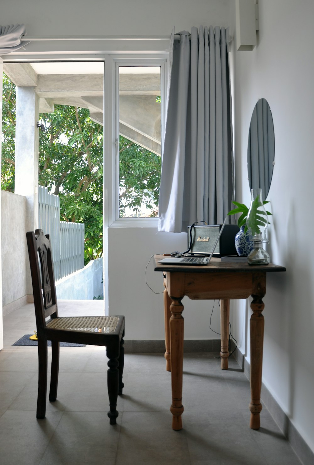 black chair in front of console table