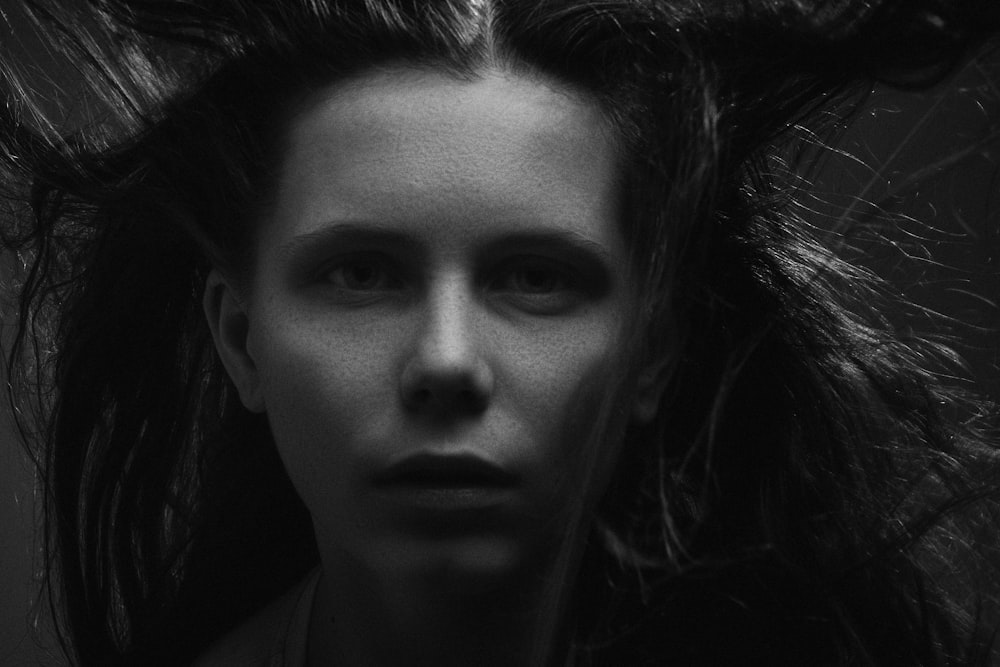 woman with wavy hair closeup photography