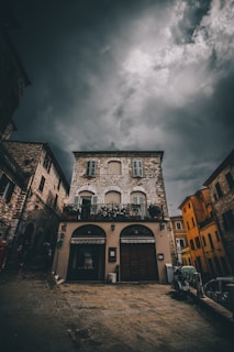 Historic stone building with balconies in a charming European town