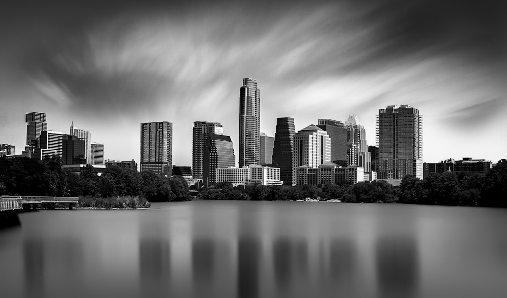 grayscale photo of city buildings