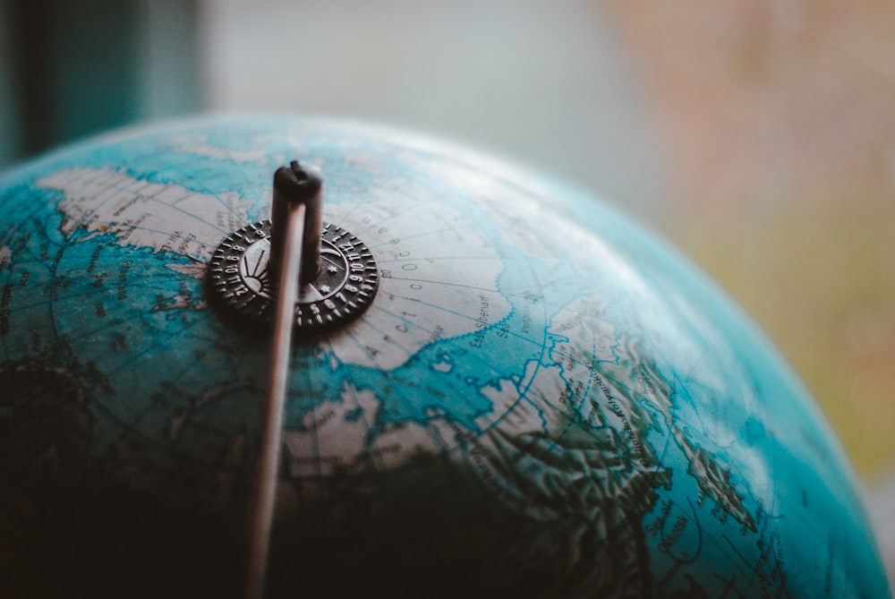 close-up photo of desk globe