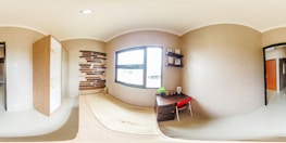 Natural light flooding into a minimalistic workspace with earthy-toned decor.