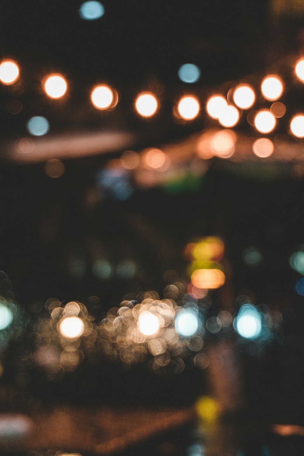 a blurry photo of a city street at night