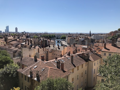 Panoramic view of Campos dos Goytacazes skyline blending tradition and modernity under a clear blue sky.