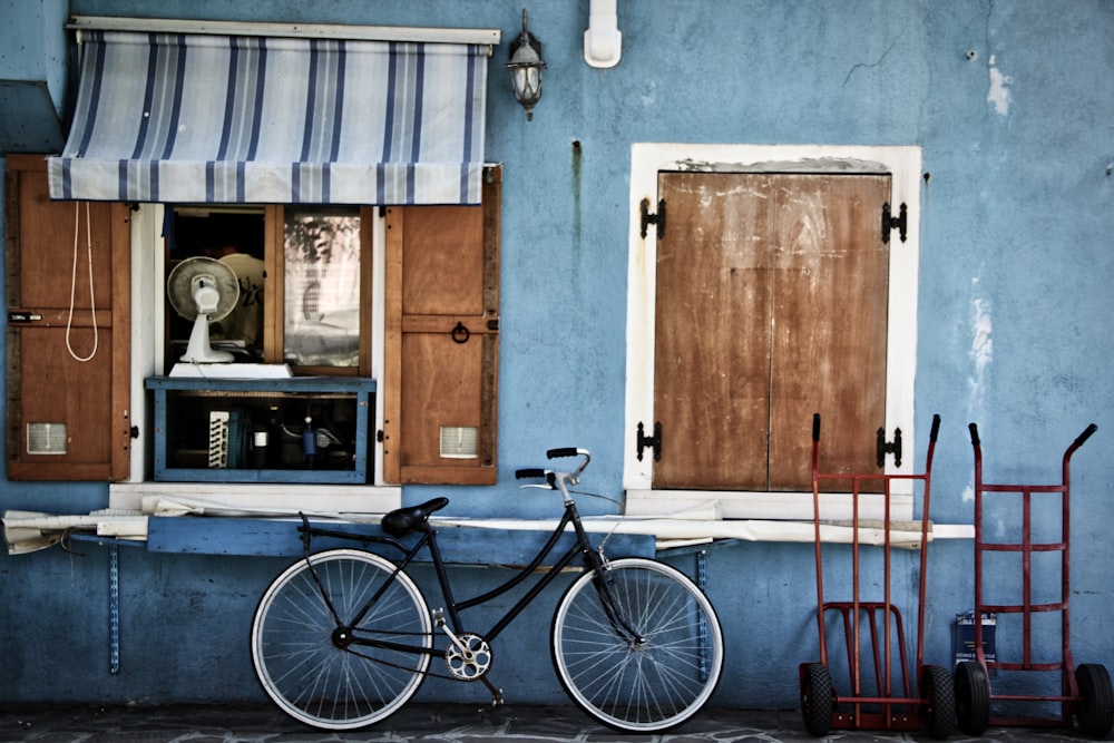 black beach cruiser bicycle