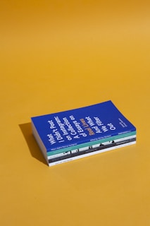 four assorted-title books