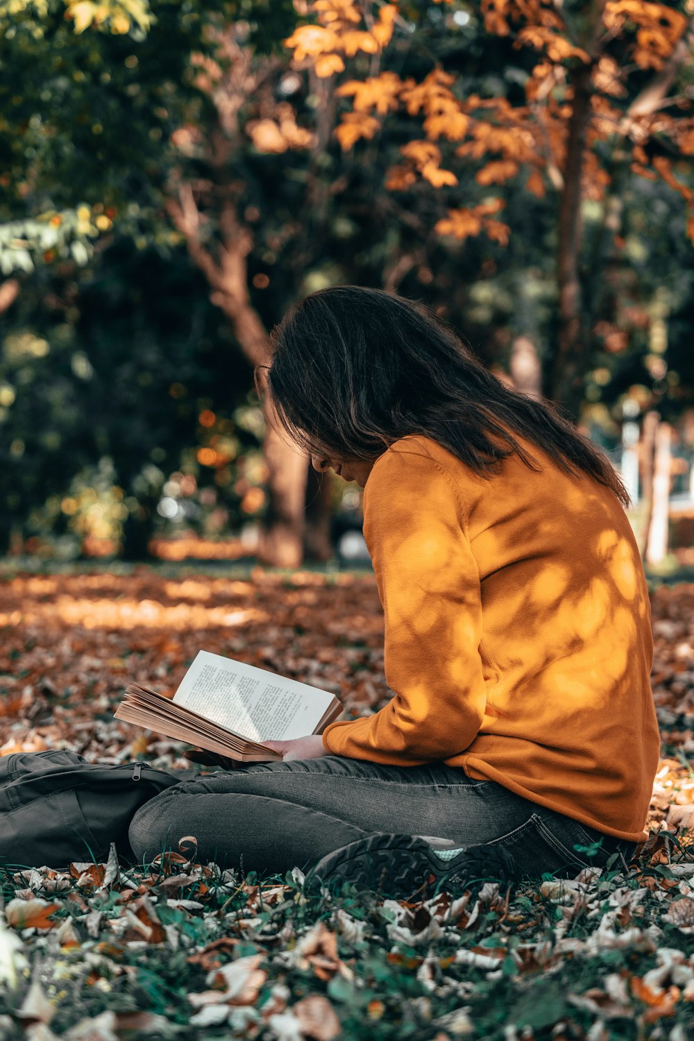 woman sitting on ground