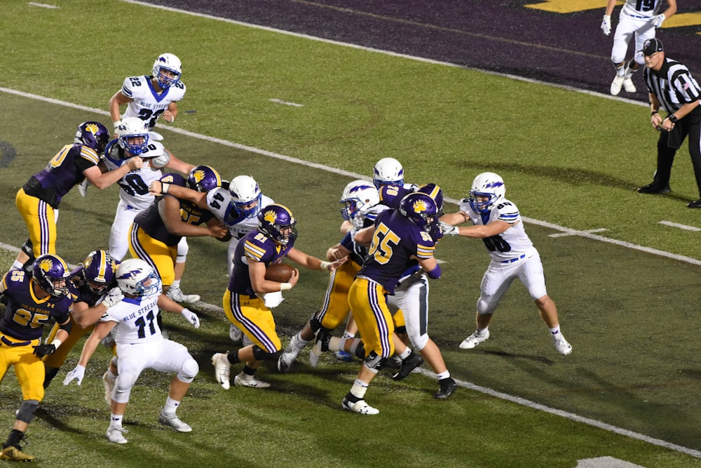 a group of people on a field playing football