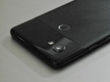 A close-up of a smartphone being unlocked.