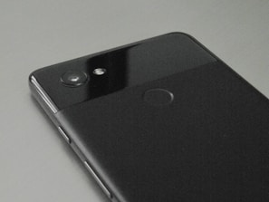 A close-up of a gently used smartphone showing its pristine screen and body, ready for a new owner.