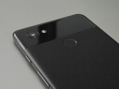 A close-up of a gently used smartphone showing its clean screen and body.