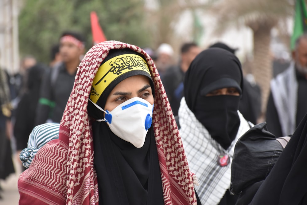 shallow focus photography of woman in black headdress