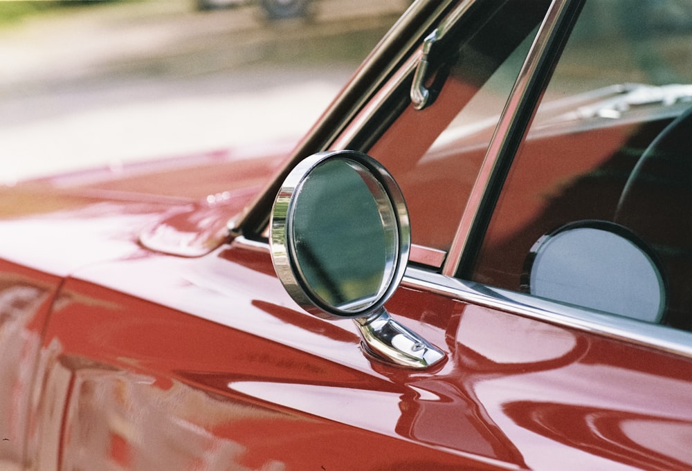 chrome car side mirror in tilt shift lens photography