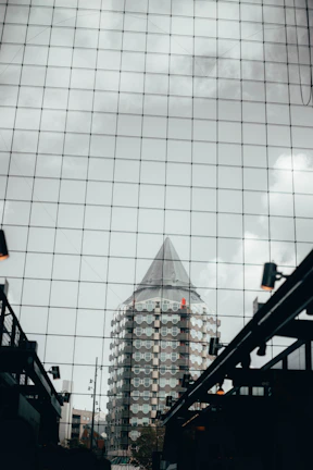 A panoramic view of the co-operative’s headquarters in Parappanangadi under a metallic silver sky.