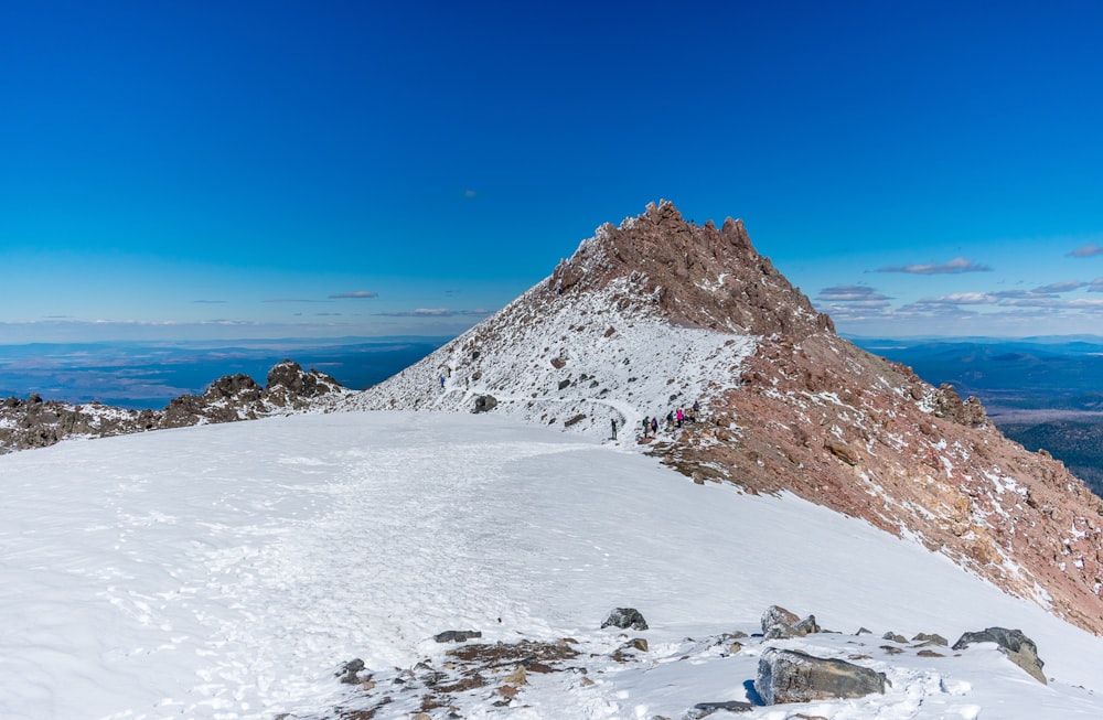 snow-covered mountain during daytime