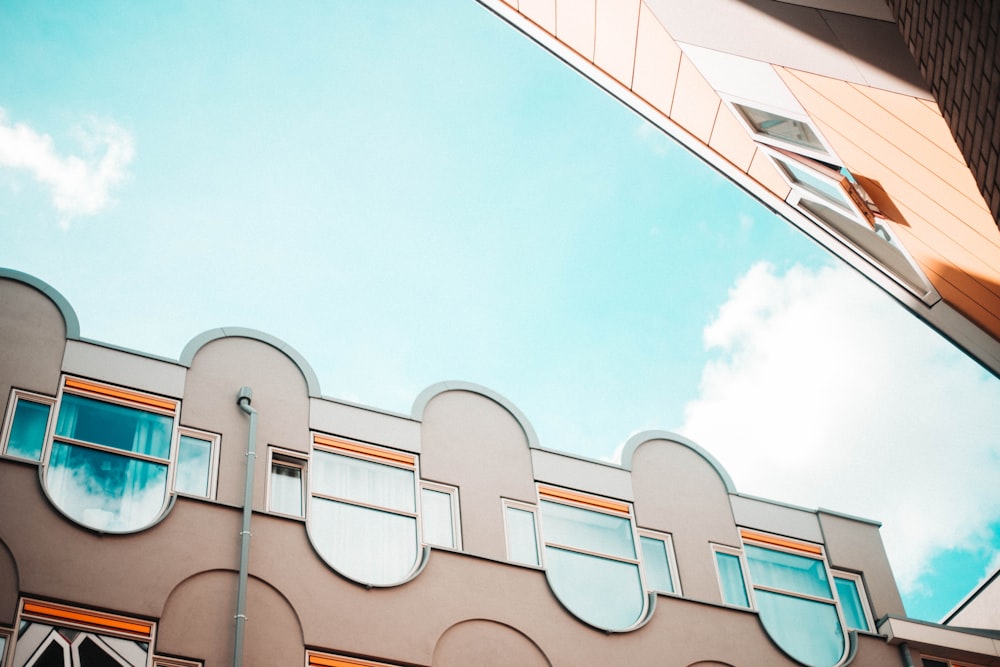 low-angle photography of high-rise concrete building