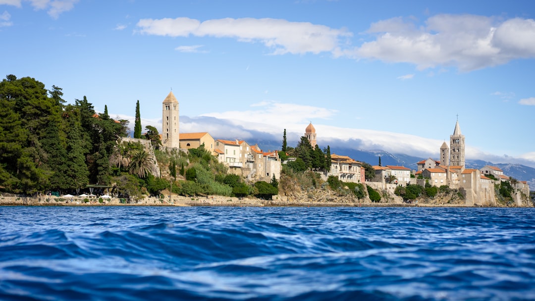 The town of Rab on the island Rab lays in the Adriatic Sea, famous for its crystal clear waters and amazing sunsets. We took the boat from the small village back to our hotel and had a great view on the four church towers.