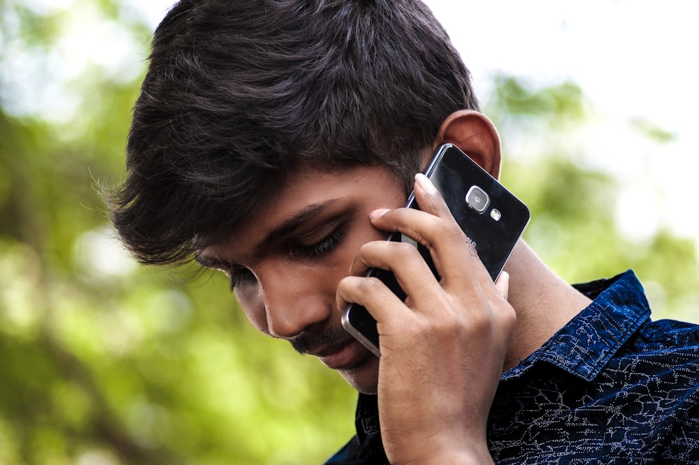 man using smartphone