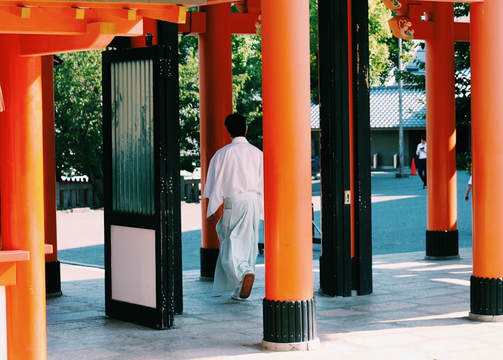 man walking in temple