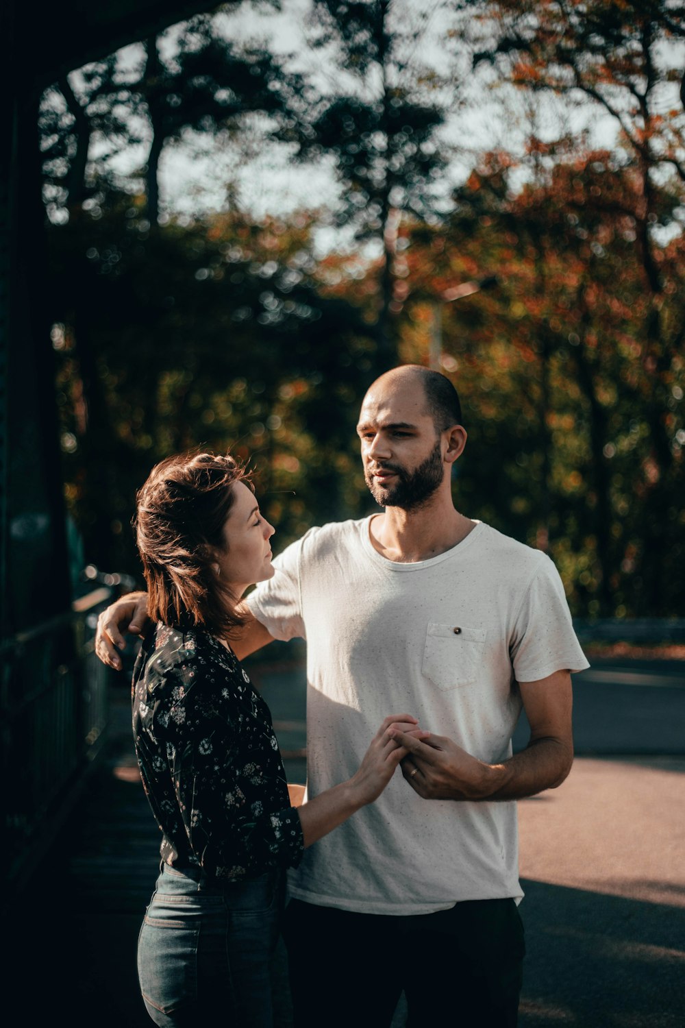 man and woman holding hands