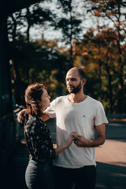 man and woman holding hands