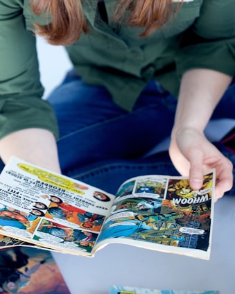 person reading comic book