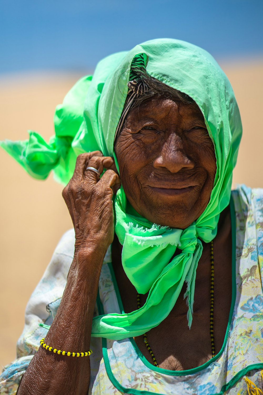 old woman standing and smiling