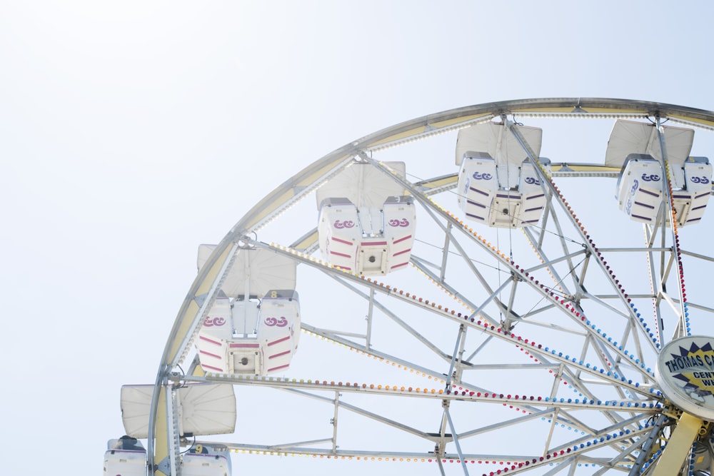 low-angle view of white Ferris wheel