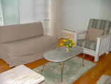 Cozy sitting area in a Trearddur Bay apartment, freshly cleaned and inviting for visitors.