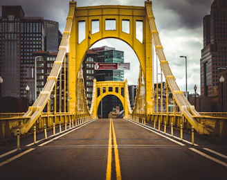 empty yellow and gray concrete bridge