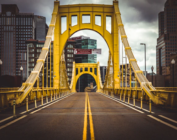 empty yellow and gray concrete bridge
