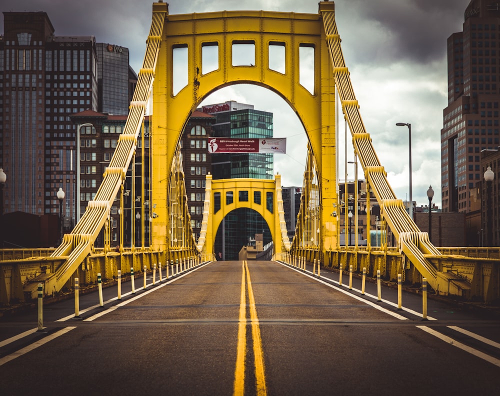 empty yellow and gray concrete bridge