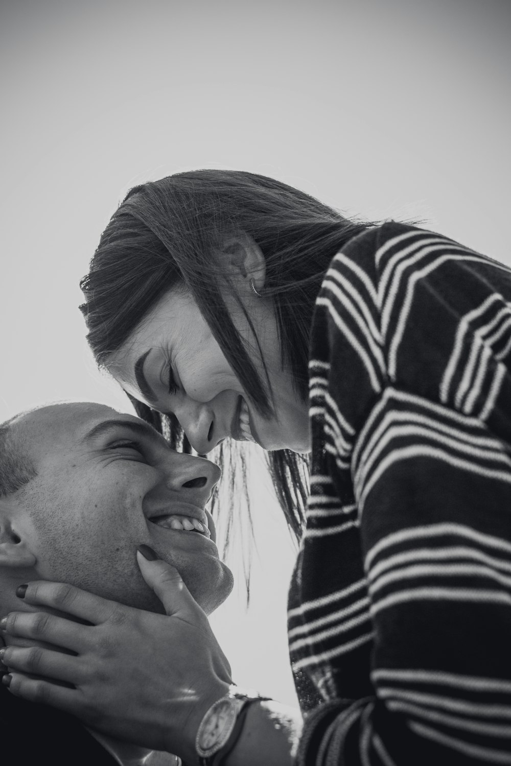 grayscale photo of man and woman