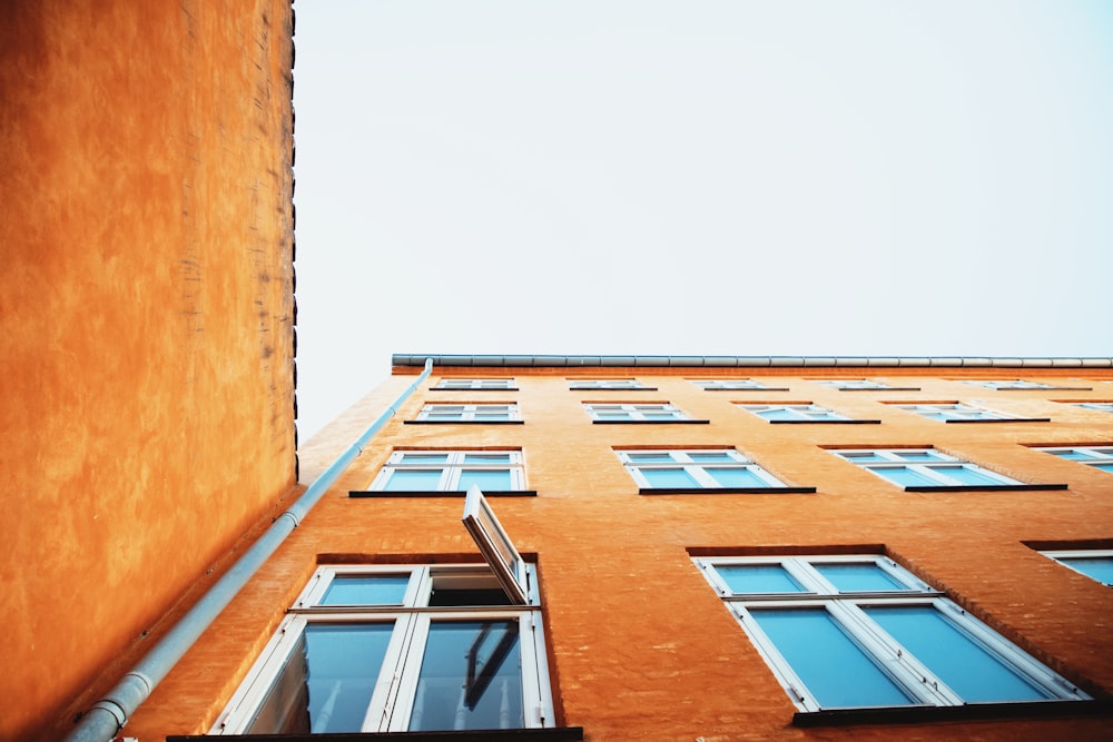 low angle photo of brown building