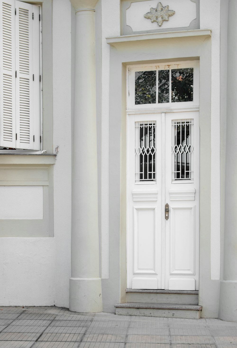 white wooden door closed