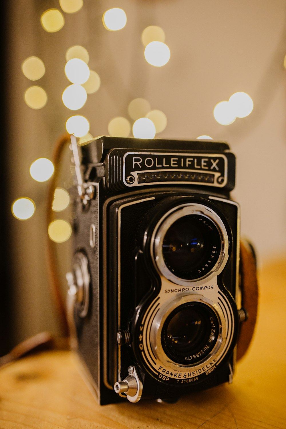 shallow focus photo of black Rolleiflex camera