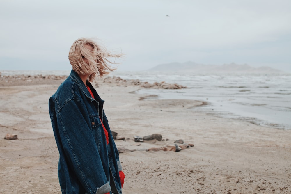 woman standing on seashore