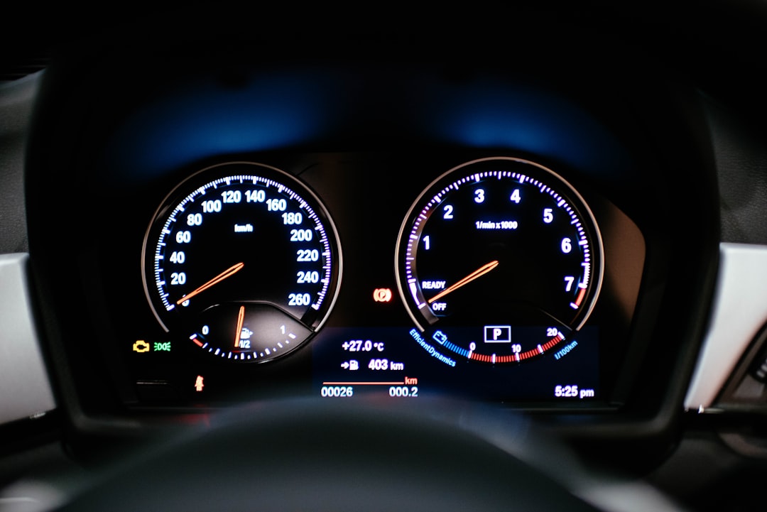 black vehicle speed-o-meter
